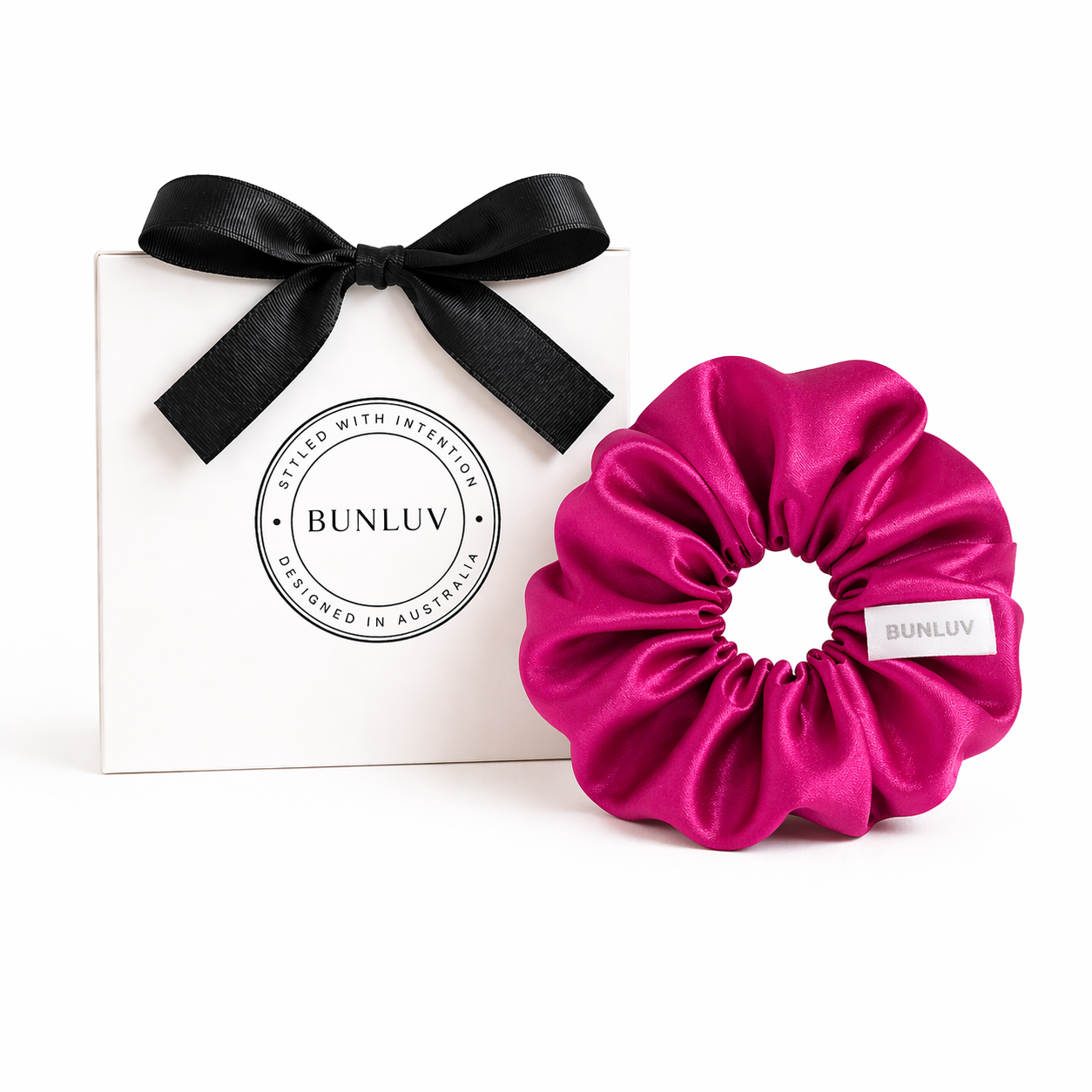 Hot pink satin scrunchie by BUNLUV, shown with gift box