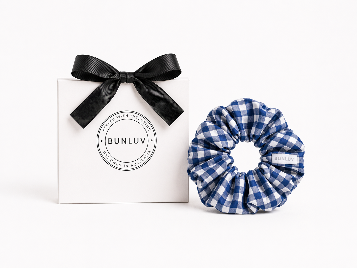 Navy gingham swim scrunchie by BUNLUV, shown with gift box