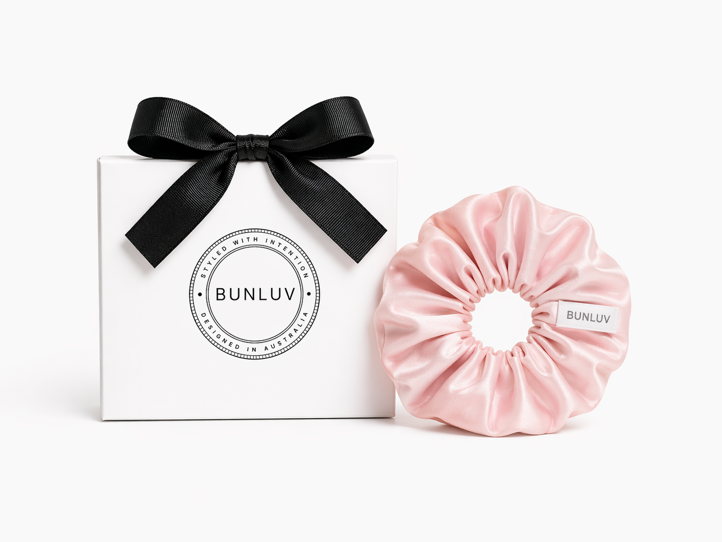 Pink satin scrunchie by BUNLUV, shown with gift box