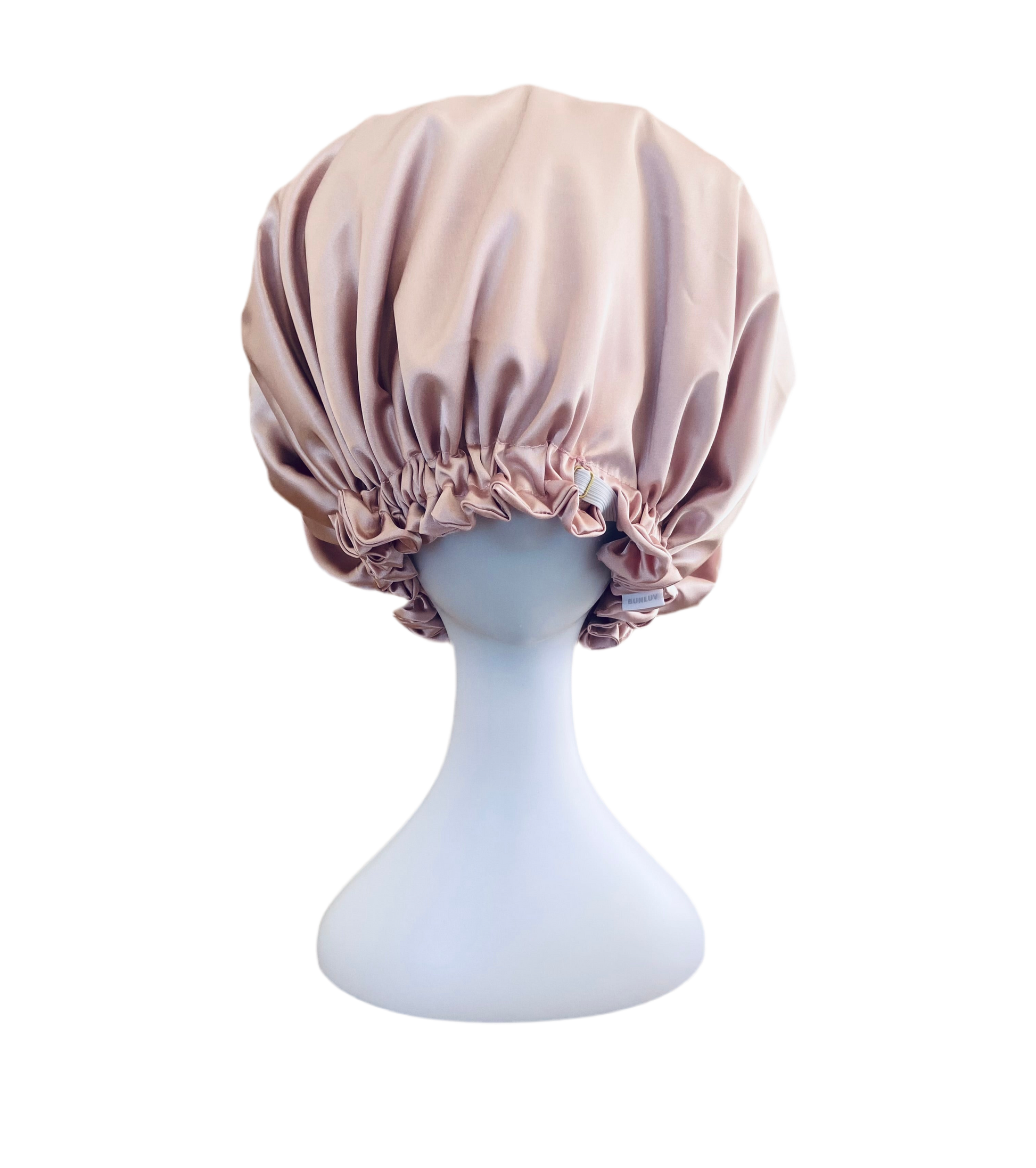Pink satin sleep bonnet by BUNLUV on white background